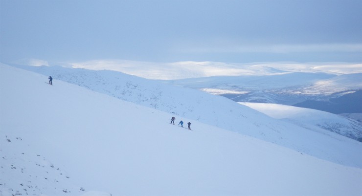 Ski tourers skin up the Fiacaill a Choire Chais