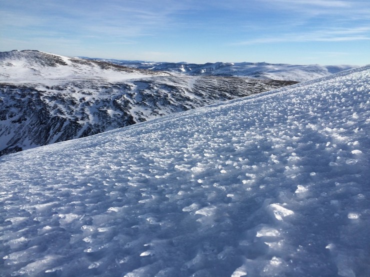 textured snow surface of rimed ice - looking toward Ben Avon