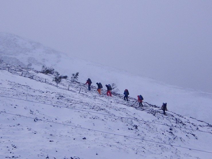 A group head up the hill via the Fiacahill a Choire Chais ridge