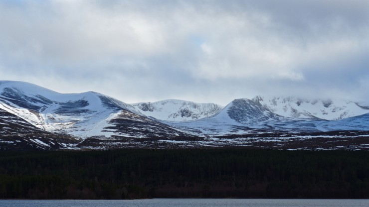 The Northern Corries from Loch Morlich with afternoon sunshine on the sloipes