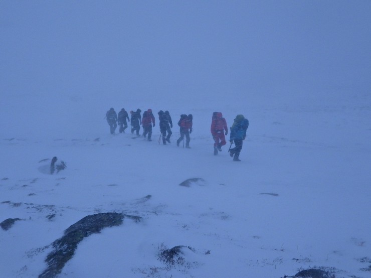 A party beating into the blizzard in Coire Chais