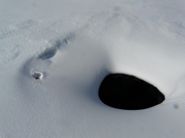 A Ptarmigans snow hole next to a spring in Coire Raibert
