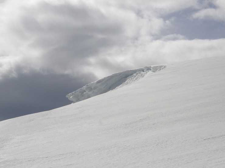 A large cornice comes into view on the approach to Cnap Coire na Spreidhe. which faces East.